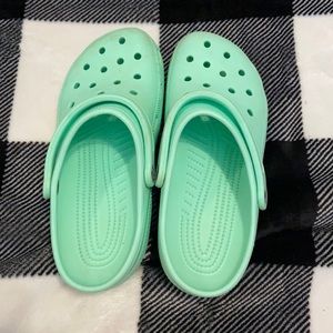 mint green crocs